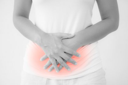Woman having a stomachache, or menstruation pain with white back